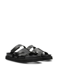 Scottie sandal – side view with thick sole and three wide faux leather straps.
