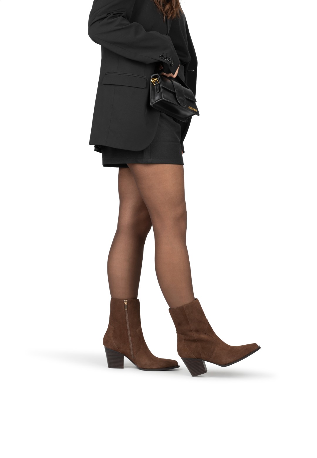 Side view of brown suede HABOOB BEAU boot styled with skirt – on foot