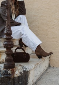 Brown suede HABOOB boot styled with white jeans – chic casual look
