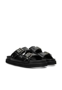 Angled front view of the black sandal pair with double buckles