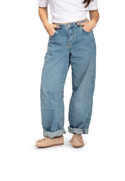 Woman wearing TAYLOR loafers with jeans