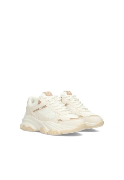 Angled front view of GIGI girls’ sneakers in a neutral light beige colorway