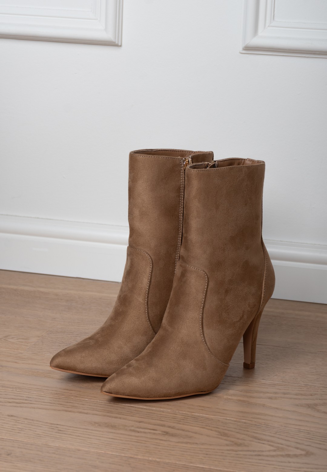 Both beige TAVERNE boots standing in lifestyle setting