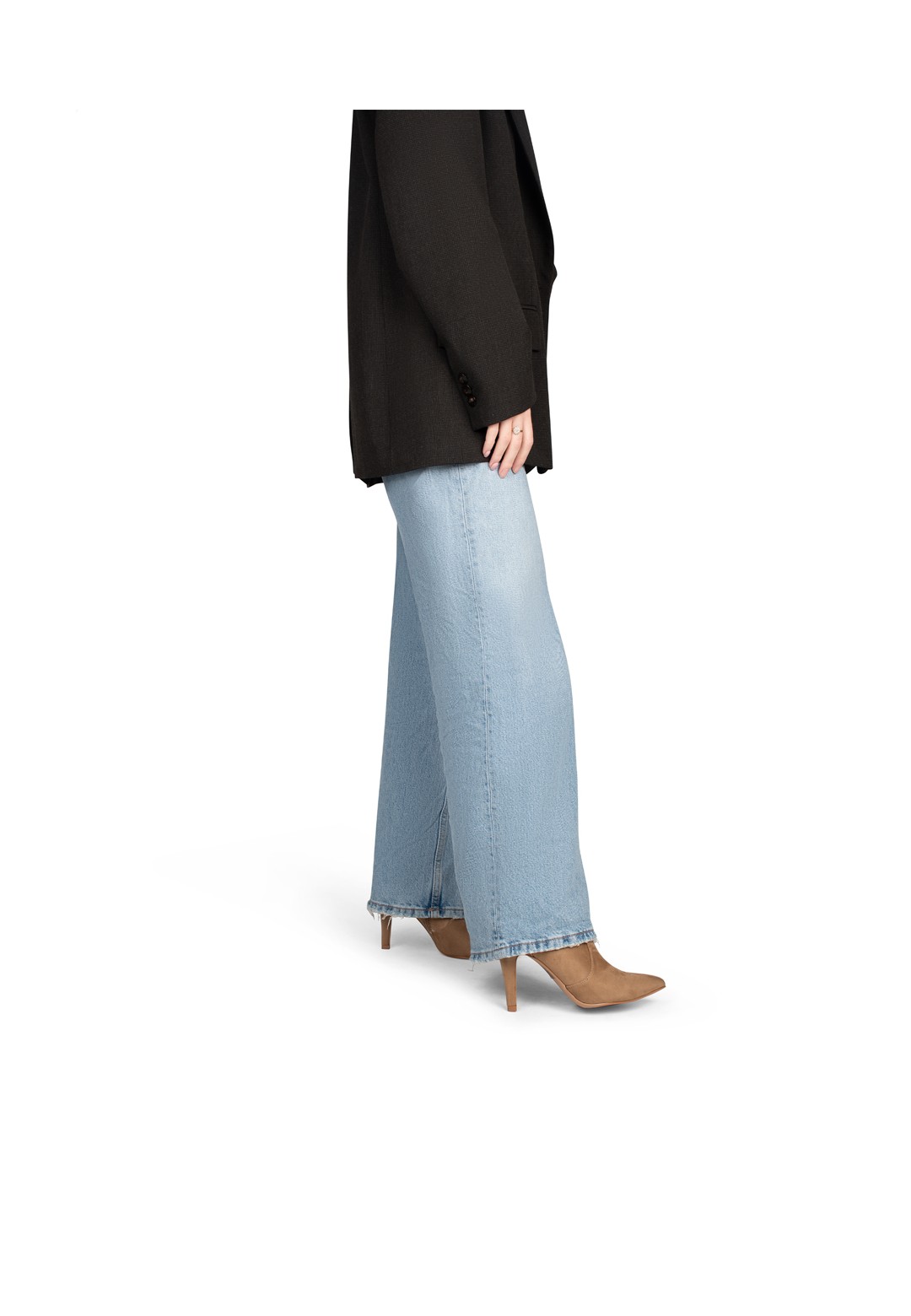 TAVERNE ankle boots paired with jeans in standing pose