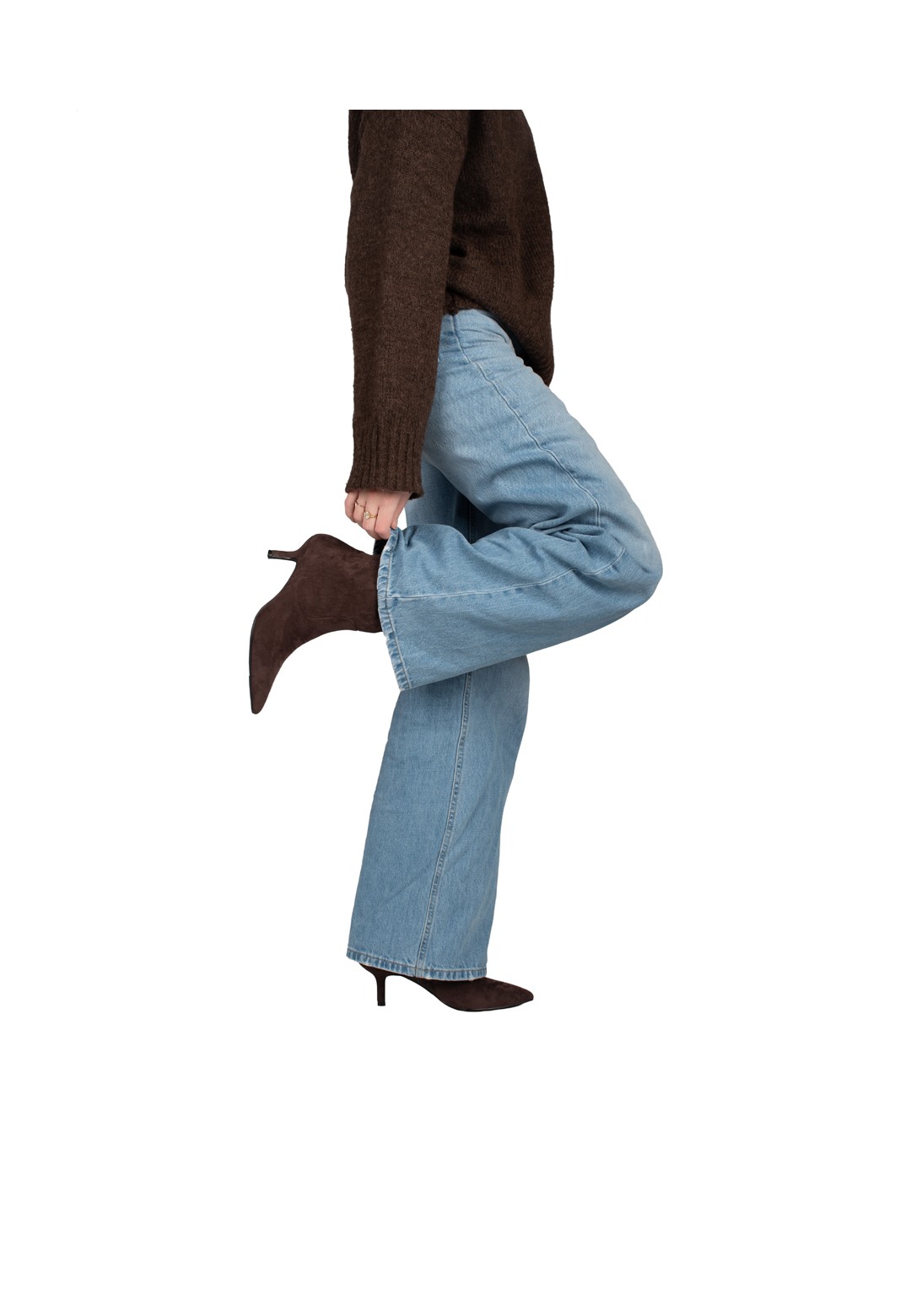 Close-up of the ELLIE boot with pointed toe and kitten heel, worn by model