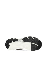 Unterseite einer sportlichen Sohle mit schwarzem Profil und Dämpfungselement