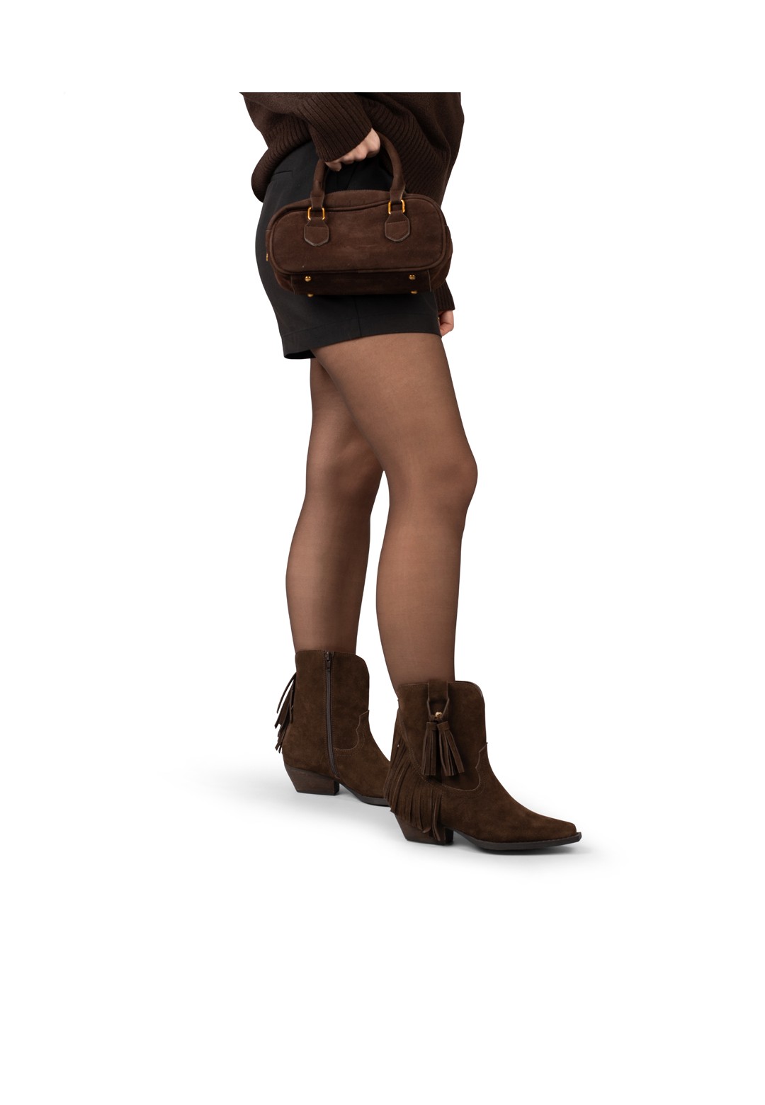 Modelbeeld: HABOOB westernlaarzen gestyled met korte rok – zijkant