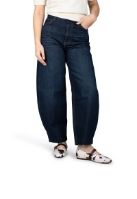 Gina cow print ballerinas worn with dark jeans – front view