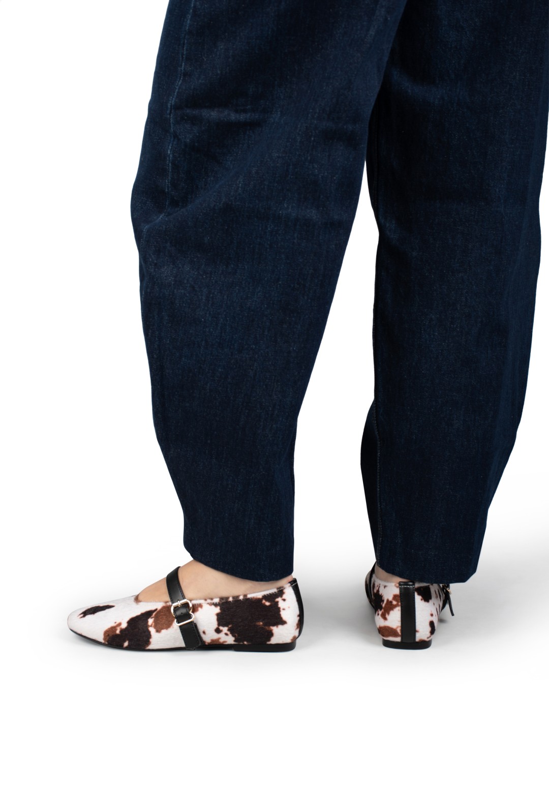 Gina cow print ballerinas worn – rear view