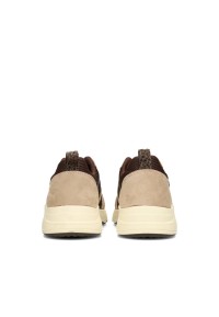 Rear view of the CAROCEL sneakers with beige heel and brown collar