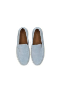 Top view of a pair of light blue suede men's loafers