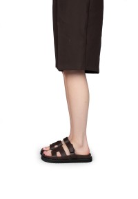 SCOTTIE sandals styled with brown shorts – side view