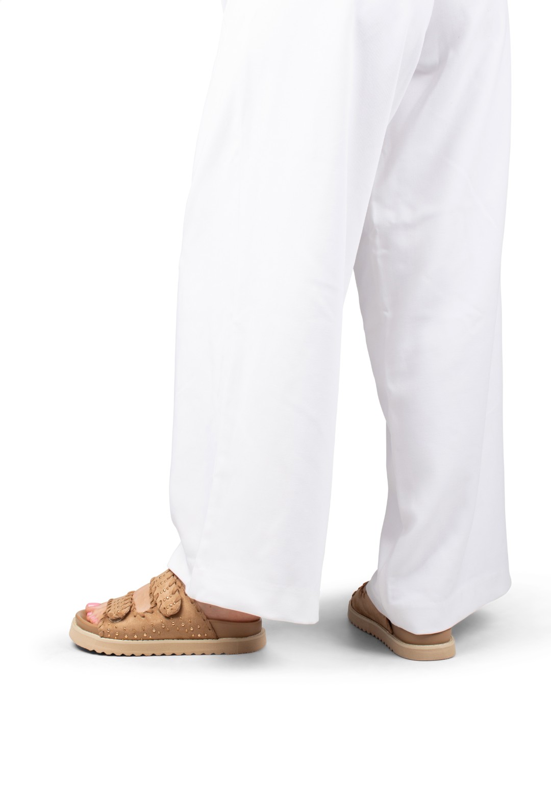 Model wearing POSH by Poelman NENA  beige sandals – back view