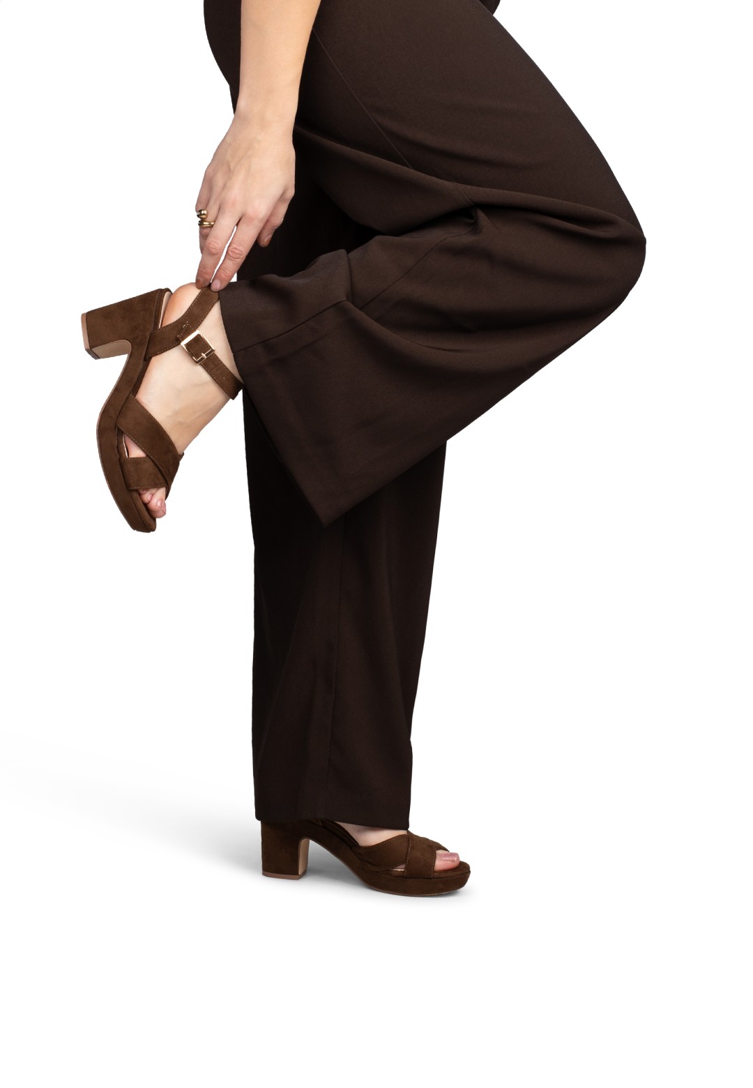 Model wearing POSH by Poelman MARY brown heeled sandals styled with trousers