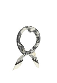 Scarf with jungle pattern tied in a knot