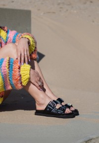Model wearing Garby sandals by POSH by Poelman