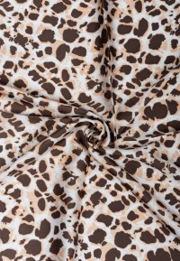 Close-up of POSH by Poelman scarf with leopard print