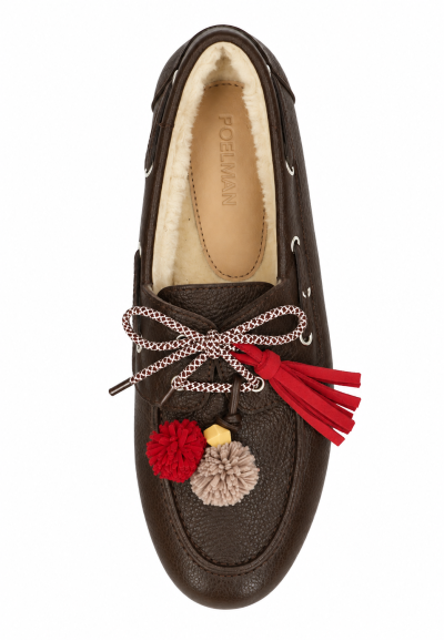 Red tassel as a decorative accessory on brown Poelman loafer
